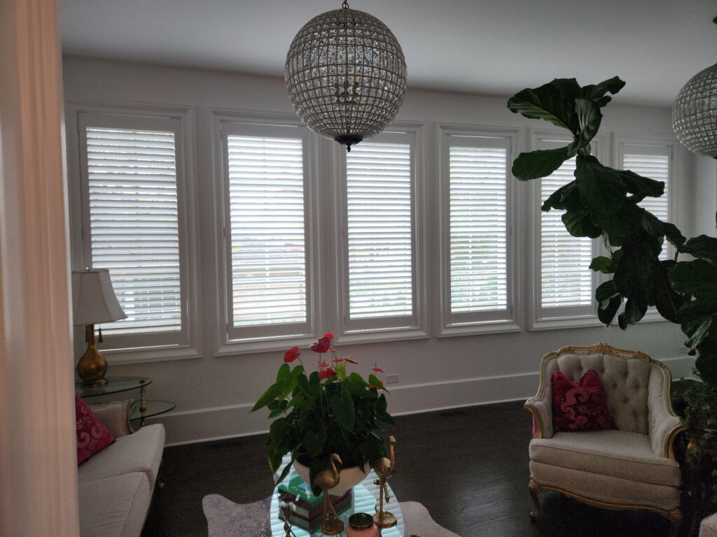hunter Douglas plantation style shutters in an elegant a family room
