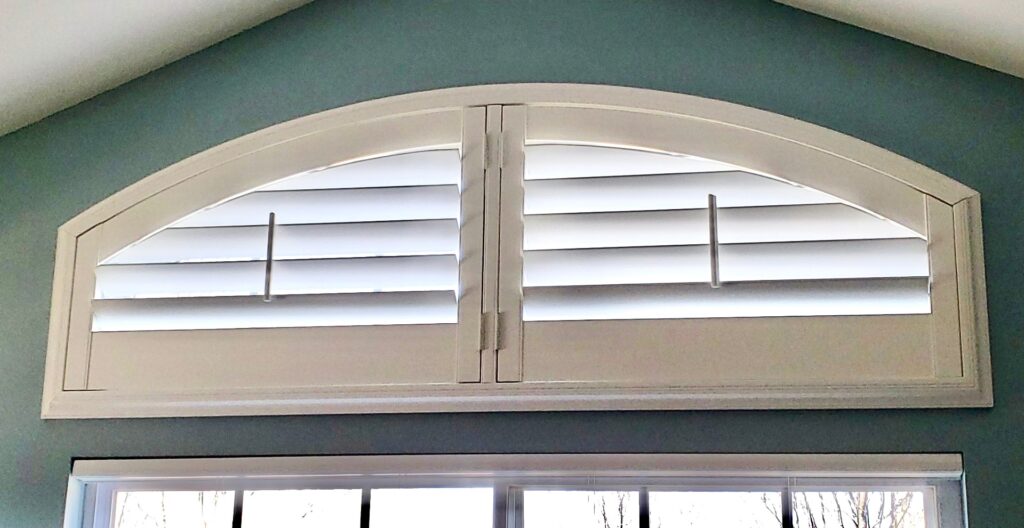 Small, arched plantation shutter installed by Ogden Blinds in Yorkville, IL