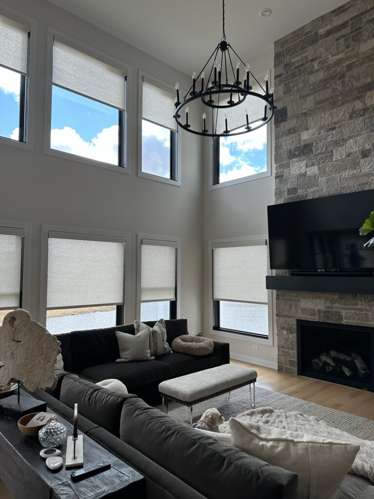 hunter Douglas designer roller shades in an elegantly decorated family room