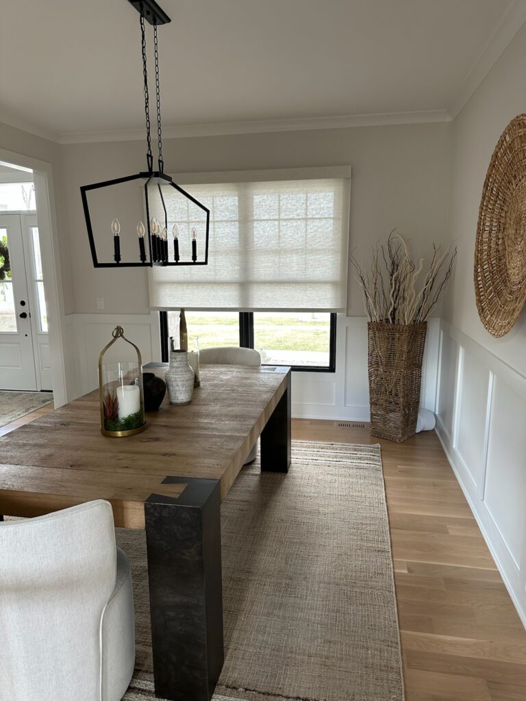 hunter douglas designer roller shades in a farmhouse style dining room.