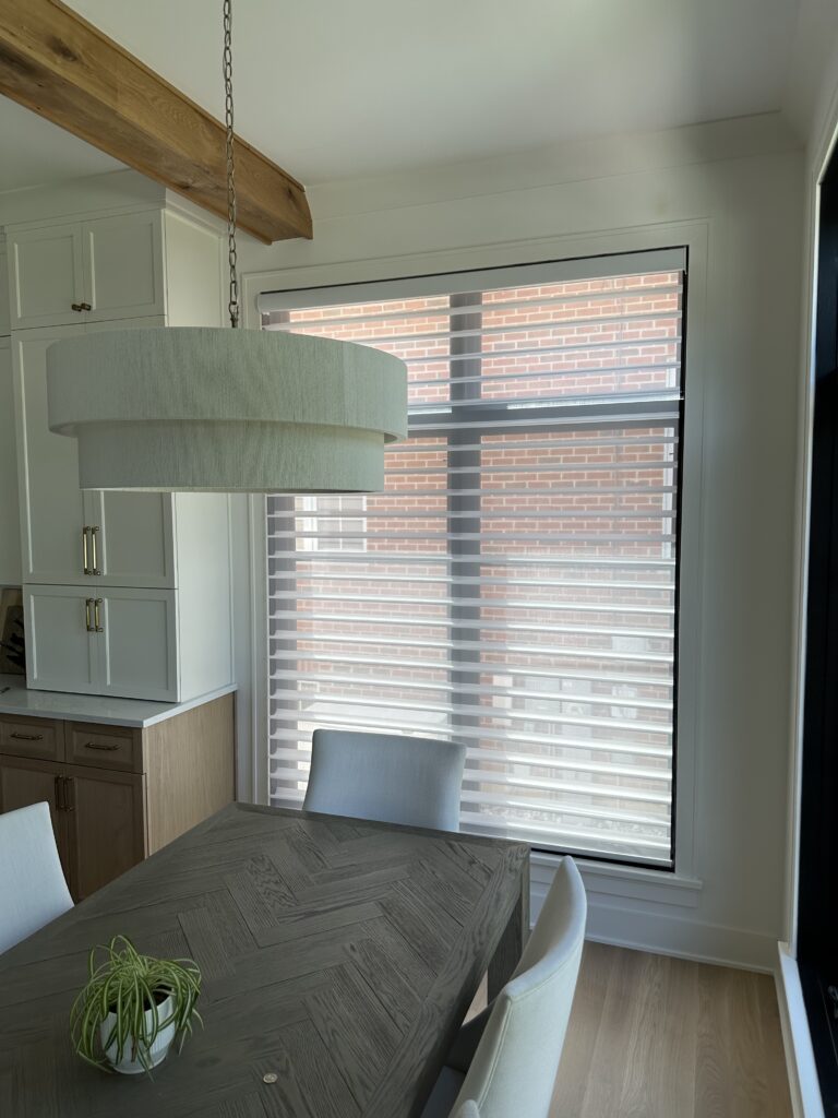 Hunter Douglas Silhouette covering a large kitchen window. Done in an Oak Brook, IL apartment.