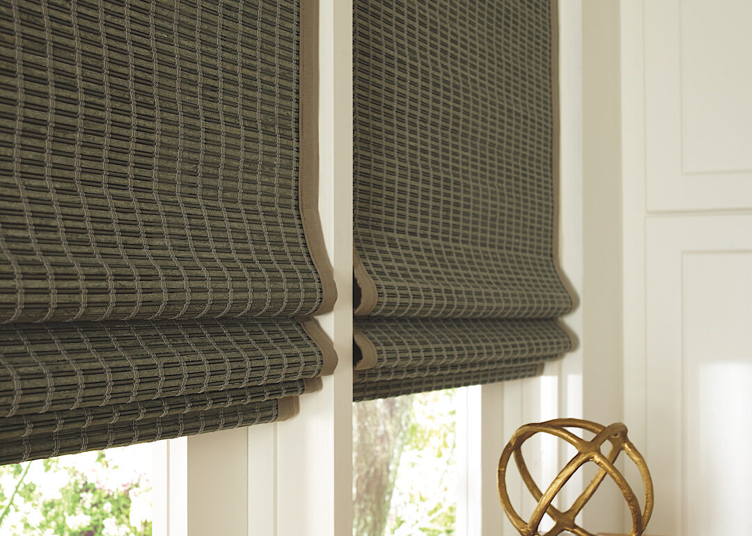Close up of how woven wood shades layer when pulled up