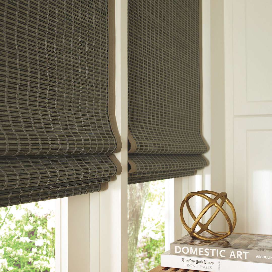 Close up of how woven wood shades layer when pulled up