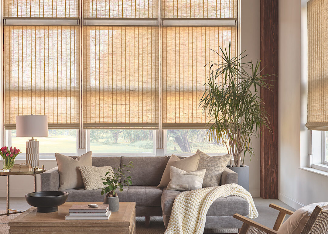 Woven wood shades in a neutral living room