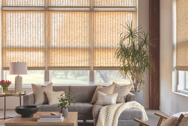Woven wood shades in a neutral living room