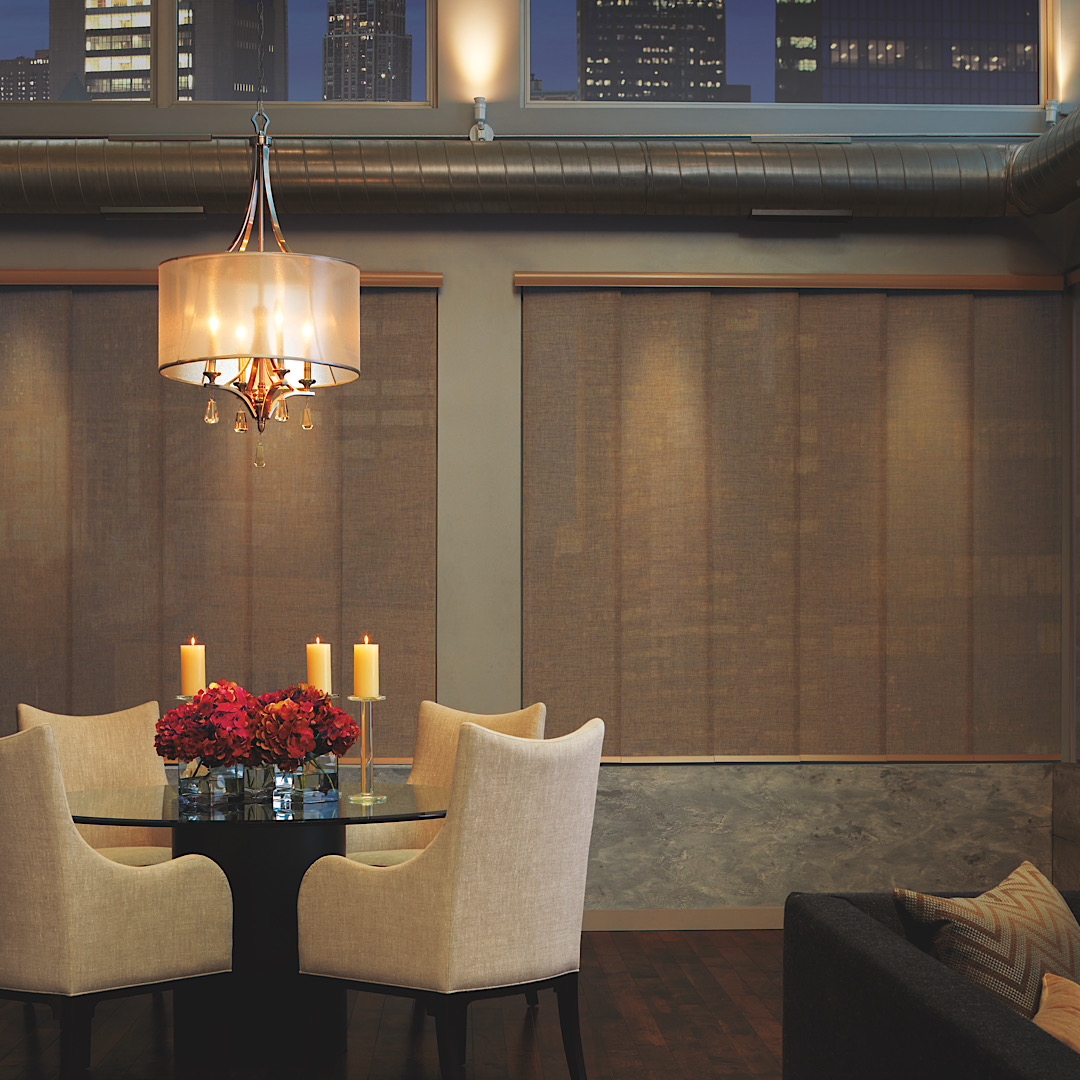 Modern dining room with hunter douglas skyline panels