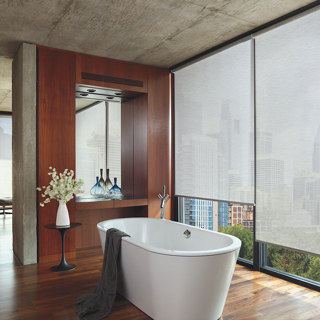 Hunter douglas white designer screen shades in a bathroom